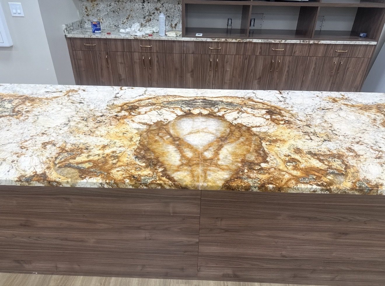Bookmatched granite slab detail showing mirrored veining across the seam, San Antonio TX